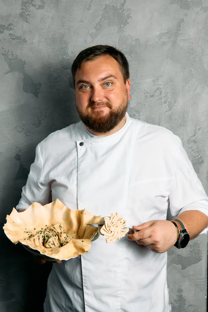 Head chef Andro with a bowl of khinkali