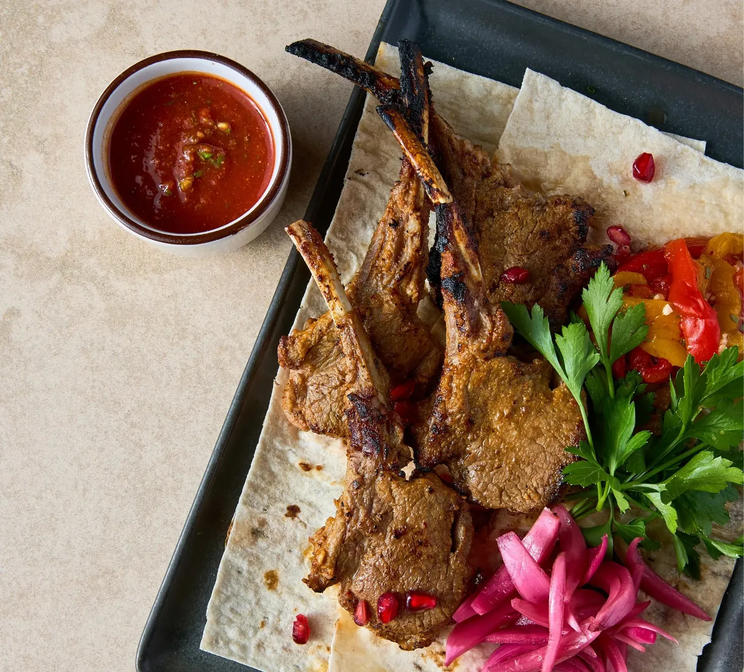 Charcoal-grilled rack of lamb with pickled vegetables