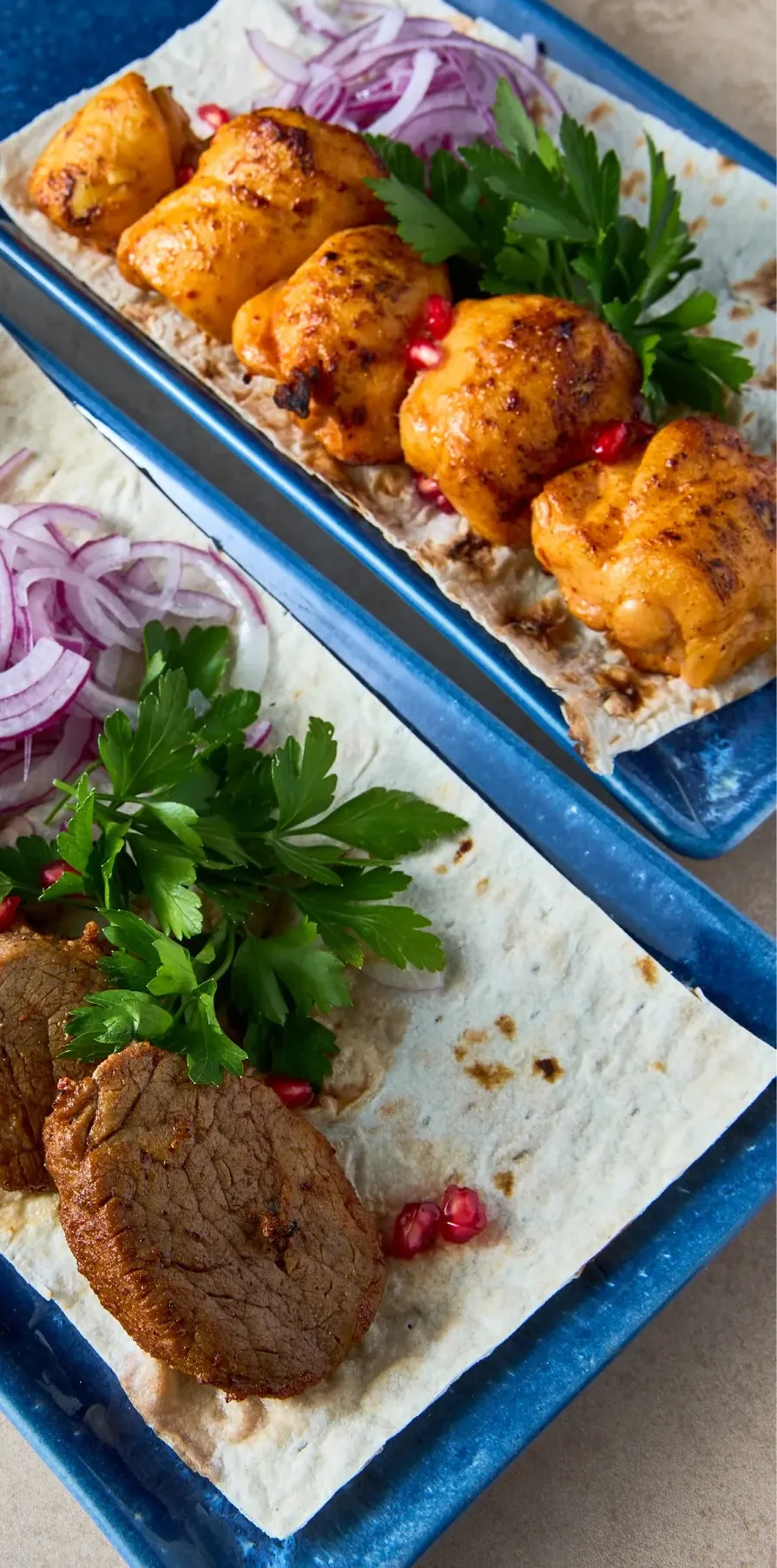 Grilled mtsvadi on lavash with red onions