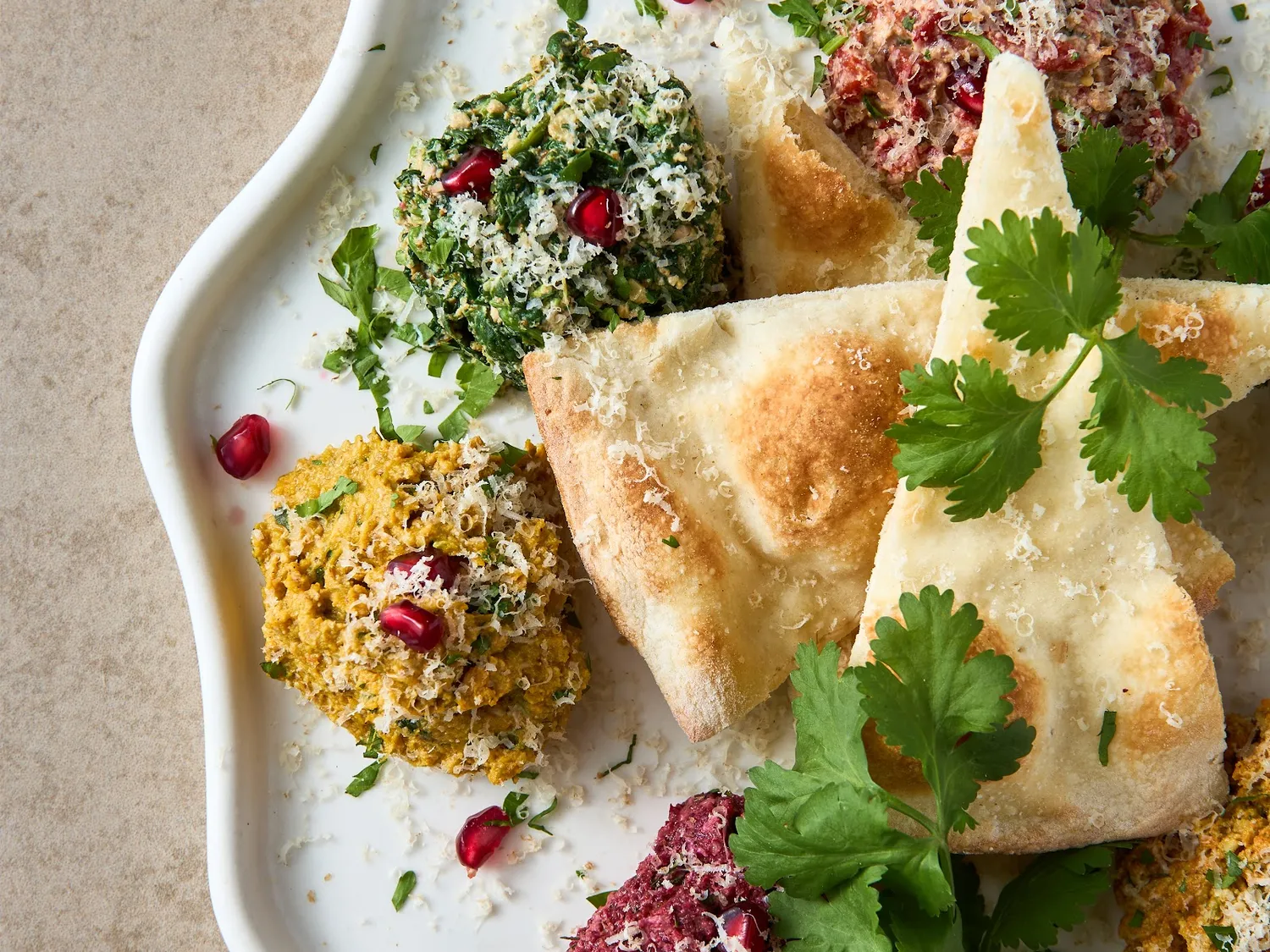Pkhali selection with aubergine rolls and bread