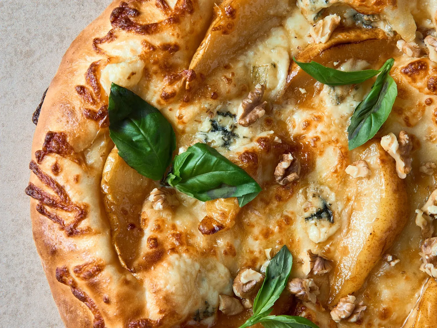 Khachapuri with caramelised pear and gorgonzola