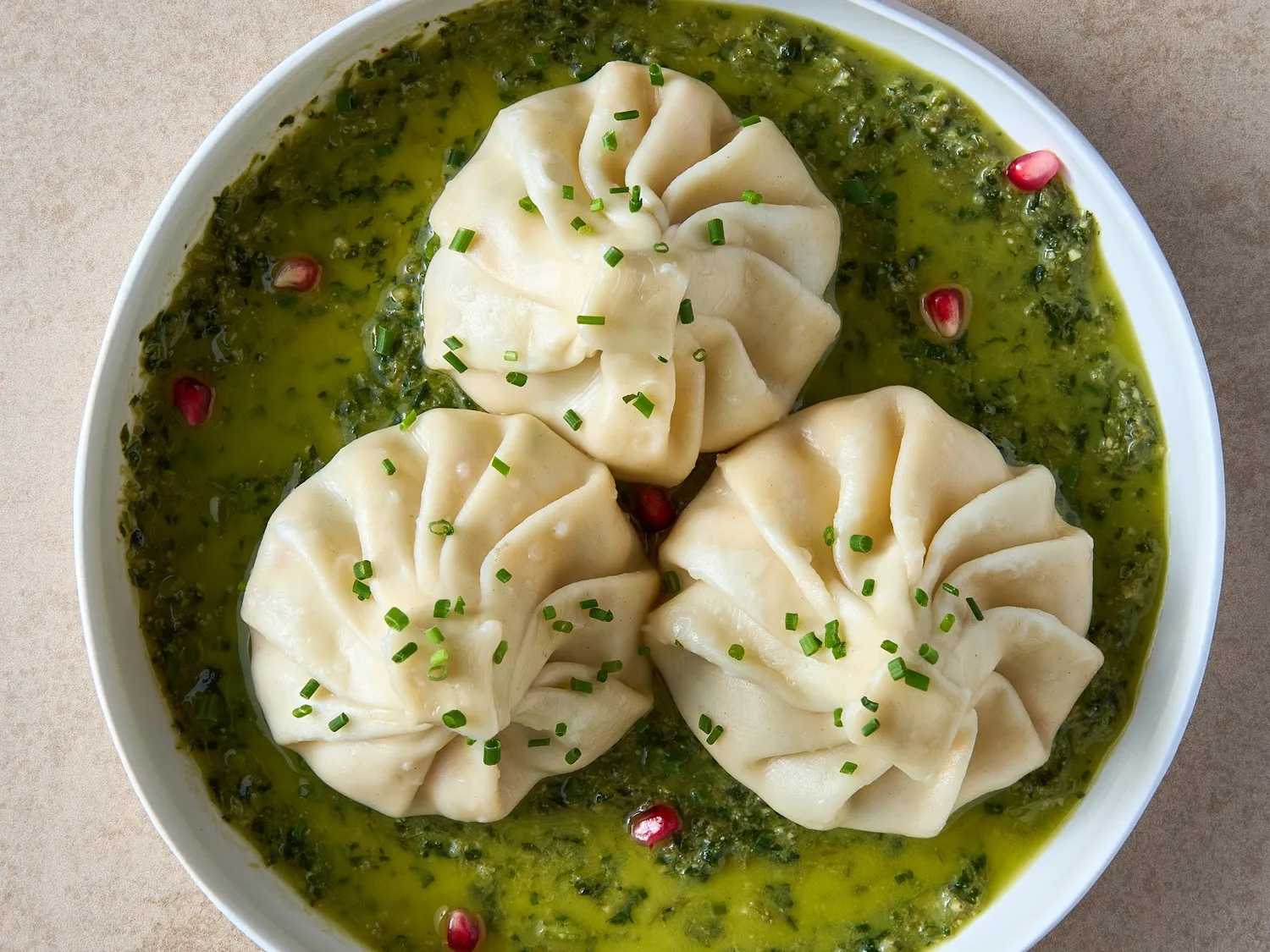 Khinkali in coriander sauce